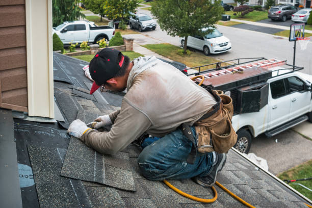 Professional Roofing technician working in Achille, OK